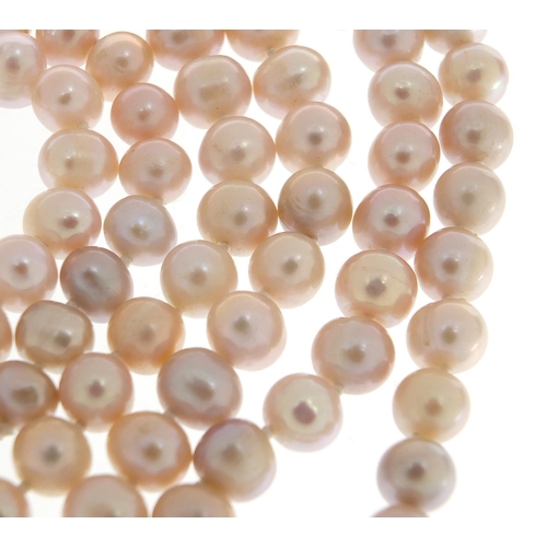 1854 - Freshwater pearl necklace, 120cm in length, each pearl approximately 7mm in diameter, 87.0g