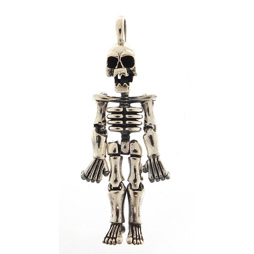 1923 - Novelty silver human skeleton pendant with articulated limbs, 5.5cm high, 15.8g