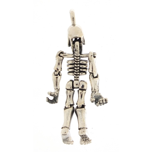 1923 - Novelty silver human skeleton pendant with articulated limbs, 5.5cm high, 15.8g