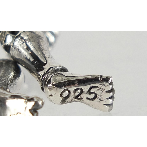 1923 - Novelty silver human skeleton pendant with articulated limbs, 5.5cm high, 15.8g