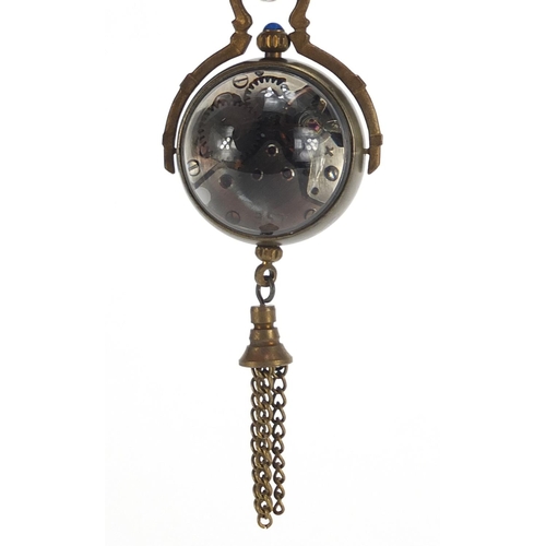 1824 - Globular glass and brass fob watch with tassel, 8cm high