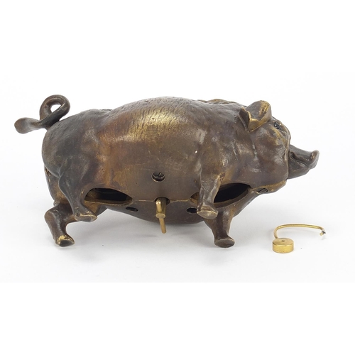 604 - Patinated bronze boar design desk bell, 16.5cm in length