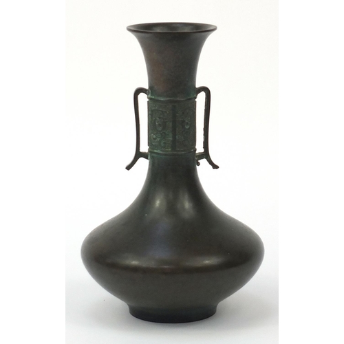 454 - Japanese patinated bronze vase with twin handles, impressed character marks to the base, 21.5cm high