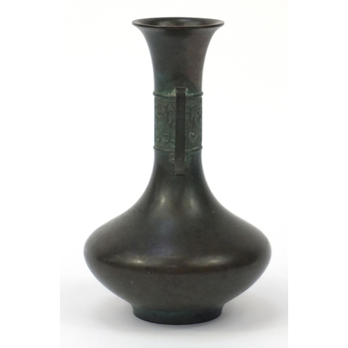 454 - Japanese patinated bronze vase with twin handles, impressed character marks to the base, 21.5cm high