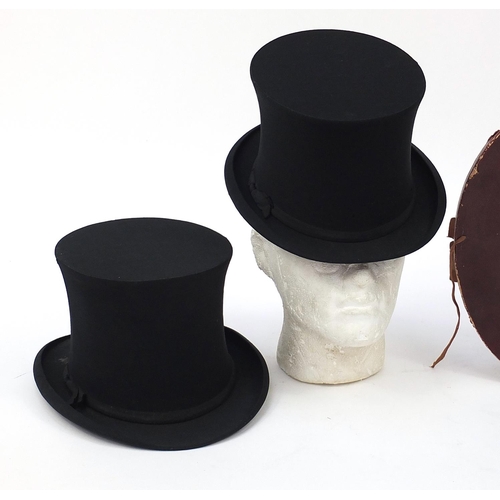 613 - Pair of 19th century collapsible top hats with box including one with West & Co stamp