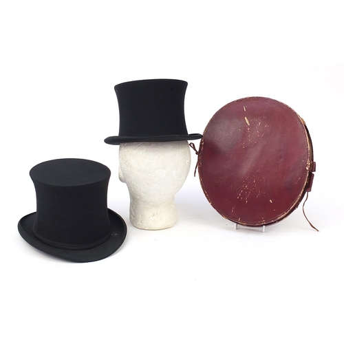 613 - Pair of 19th century collapsible top hats with box including one with West & Co stamp