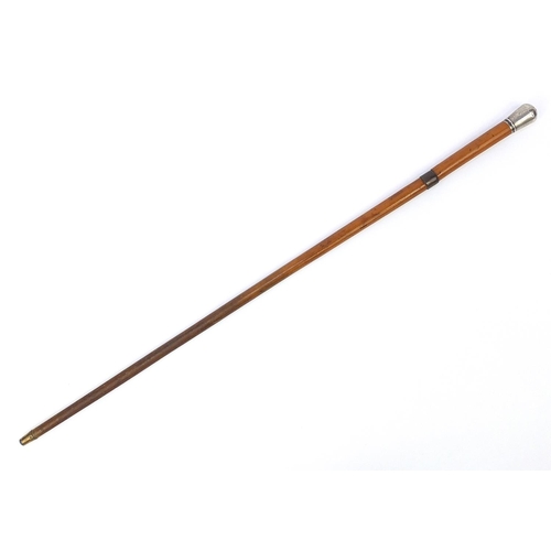 873 - Malacca sword stick with silver pommel and steel blade, 91cm in length