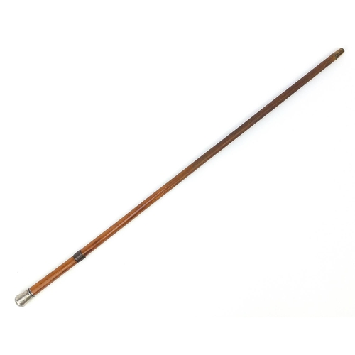 873 - Malacca sword stick with silver pommel and steel blade, 91cm in length