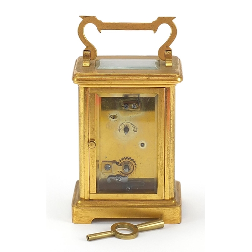 615 - Brass cased carriage clock with enamel dial and Roman numerals, 11.5cm high