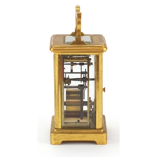 615 - Brass cased carriage clock with enamel dial and Roman numerals, 11.5cm high