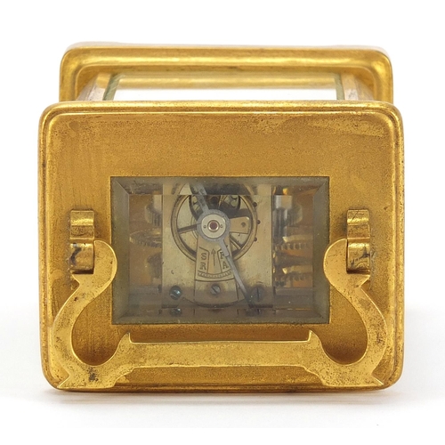 615 - Brass cased carriage clock with enamel dial and Roman numerals, 11.5cm high