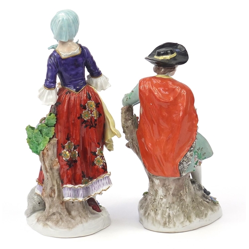 405 - Pair of German porcelain figures with sheep, the largest 24.5cm high