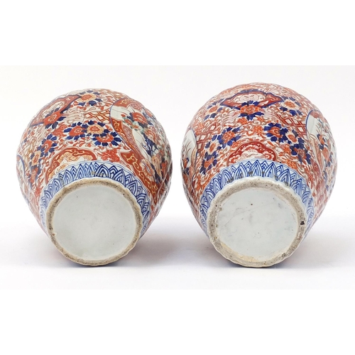 60 - Large pair of Japanese Imari lidded porcelain vases, each profusely hand painted with flowers, 45cm ... 