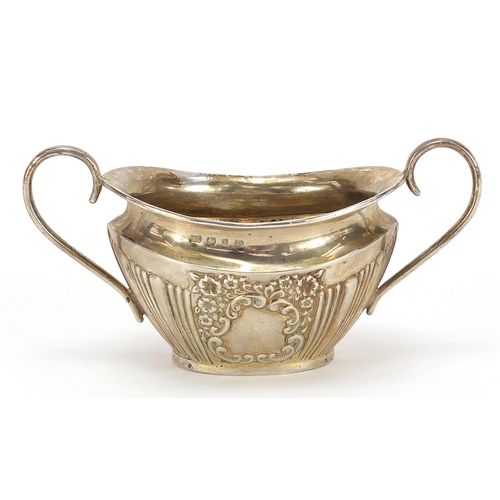 43 - Joseph Gloster Ltd, Victorian silver sugar bowl with demi fluted body, blank cartouche and twin hand... 