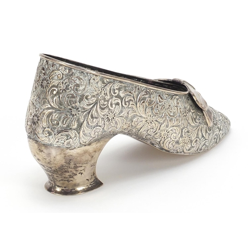 233 - George Nathan & Ridley Hayes, large Edwardian silver ladies shoe profusely embossed with flowers and... 