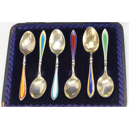 723 - Barker Brothers Silver Ltd, set of six silver and guilloche enamel teaspoons housed in a Henry Wells... 