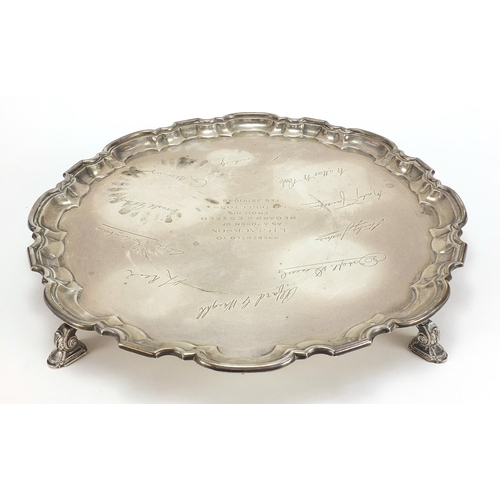 237 - Mappin & Webb, large George VI silver salver raised on four feet with presentation inscription and s... 