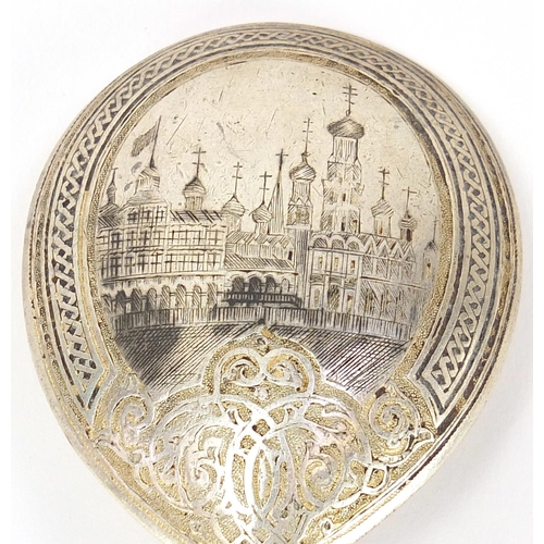 205 - Russian silver niello work spoon, the bowl engraved with a cathedral, 15.5cm in length, 41.5g