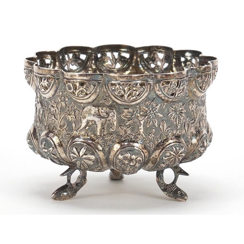 236 - Burmese unmarked silver bowl, pierced and embossed with figures hunting wild animals and raised on t... 