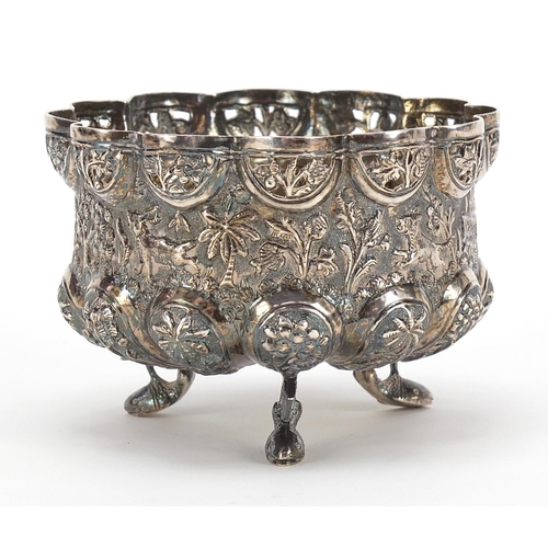 236 - Burmese unmarked silver bowl, pierced and embossed with figures hunting wild animals and raised on t... 