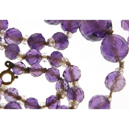 2027 - Vintage graduated amethyst and crystal bead necklace, 80cm in length, 50.2g