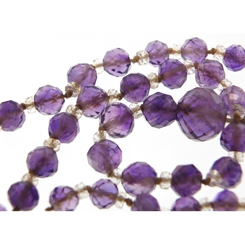 2027 - Vintage graduated amethyst and crystal bead necklace, 80cm in length, 50.2g