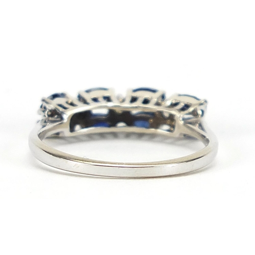 950 - 18ct white gold sapphire and diamond two row half eternity ring, size L, 2.1g