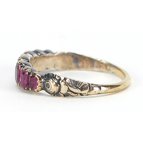 826 - Antique unmarked gold ruby seven stone ring, size M, 2.0g