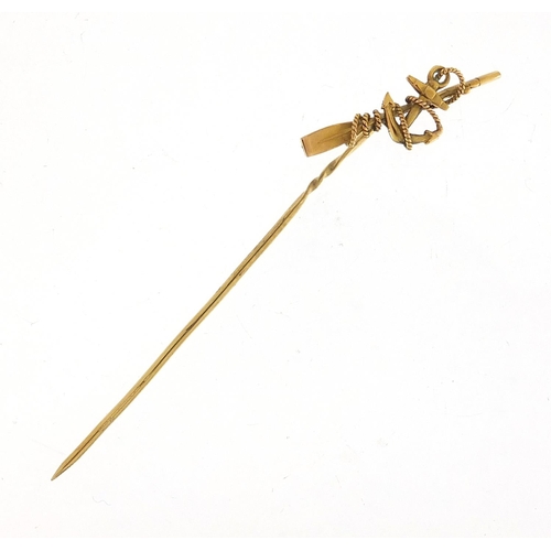 283 - Victorian maritime rowing interest 15ct gold stick pin with anchor and oar, 7.5cm in length, 1.8g