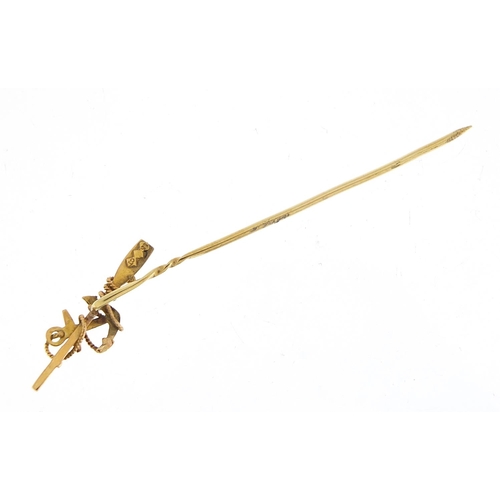 283 - Victorian maritime rowing interest 15ct gold stick pin with anchor and oar, 7.5cm in length, 1.8g