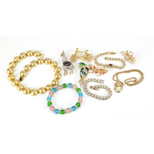 1853 - Vintage and later jewellery including bracelets set with clear stones, jewelled and enamel animal br... 