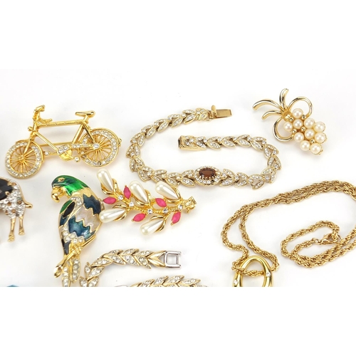 1853 - Vintage and later jewellery including bracelets set with clear stones, jewelled and enamel animal br... 