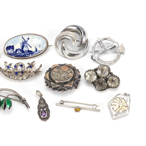 800 - Antique and later silver brooches including paste and seed pearls, Art Nouveau design and a moonston... 