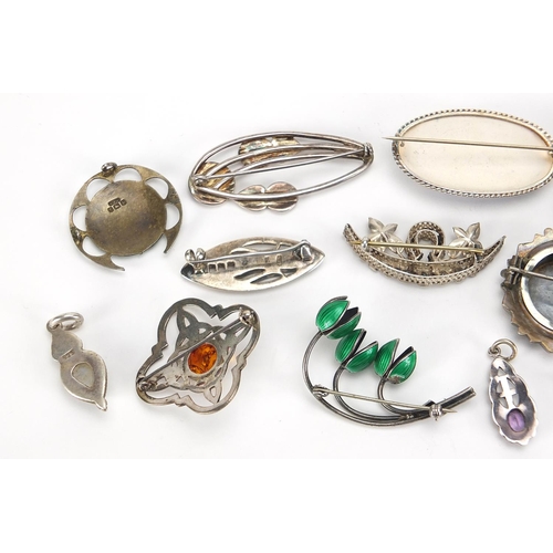 800 - Antique and later silver brooches including paste and seed pearls, Art Nouveau design and a moonston... 