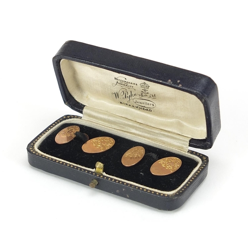 51 - Pair of 9ct gold cufflinks with engraved decoration housed in a W Pyke & Son velvet and silk lined b... 