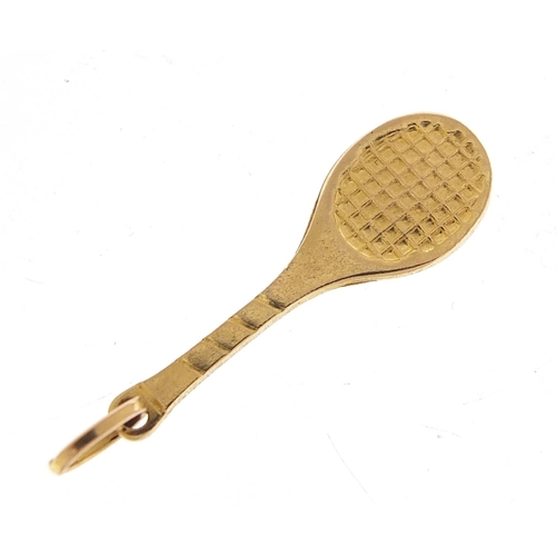 1851 - 9ct gold tennis racket charm, 2.2cm in length, 0.8g