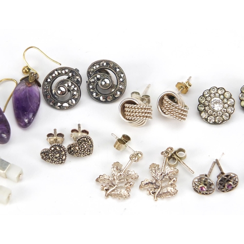 2556 - Group of silver and white metal earrings including marcasite, amethyst and horn, the largest 3cm hig... 