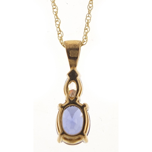 321 - 9ct gold tanzanite and cubic zirconia pendant on a 9ct gold necklace, 2cm high and 44cm in length, t... 