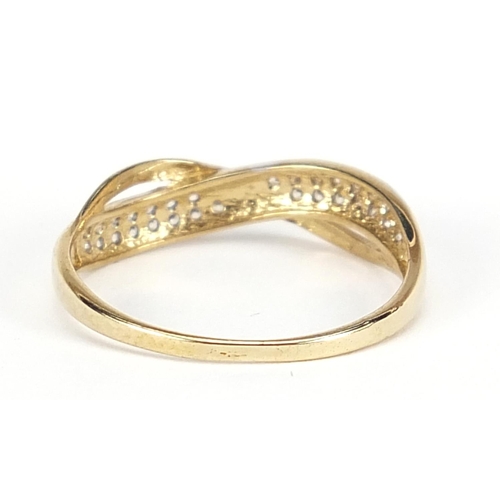 567 - 9ct gold cubic zirconia half eternity crossover ring, size O, 1.4g