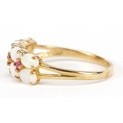 769 - 9ct gold opal and ruby ring, size R, 2.6g