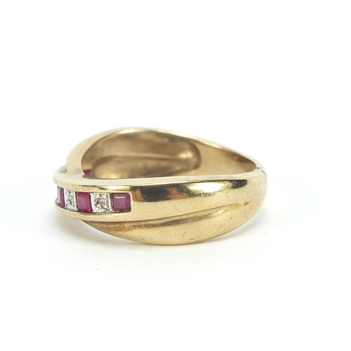 181 - 9ct gold ruby and diamond crossover half eternity ring, size J, 2.6g