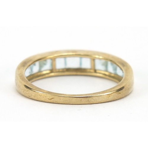 861 - 9ct gold blue stone half eternity ring, size R, 2.7g