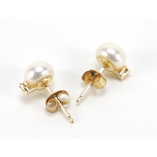 905 - Pair of 14ct gold freshwater pearl and diamond stud earrings, 8mm high, 1.0g