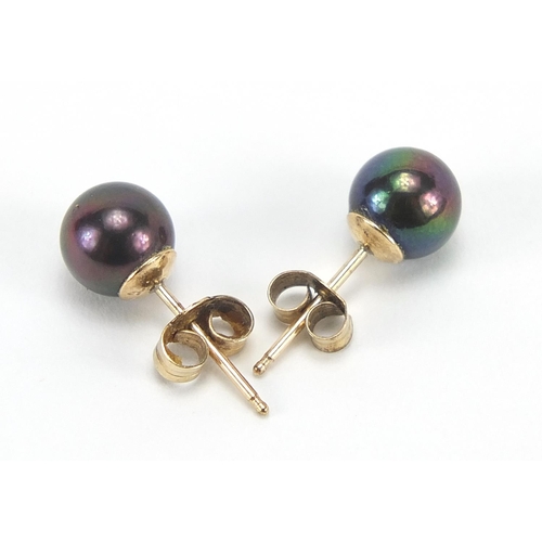 736 - Pair of 9ct gold cultured black pearl stud earrings, 6mm in diameter, 0.9g