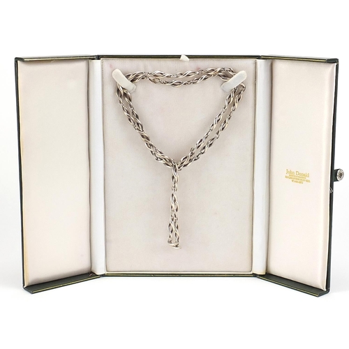 49 - Mappin & Webb Modernist silver necklace and bracelet housed in a John Donald velvet and silk lined b... 