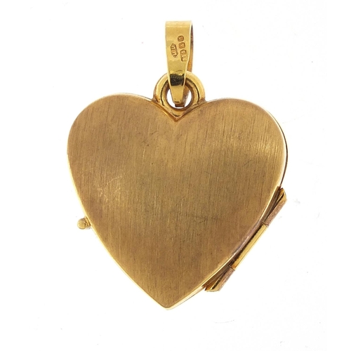 523 - 9ct gold love heart locket with engraved decoration, 2cm high, 1.7g