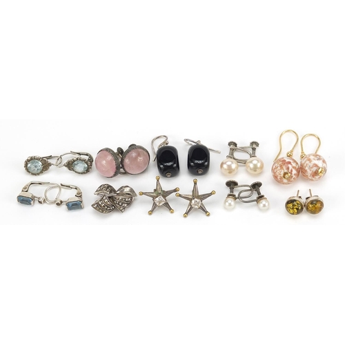 2100 - Ten pairs of earrings including some silver set with semi precious stones including amber, pearls an... 