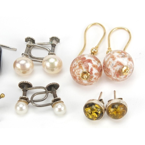 2100 - Ten pairs of earrings including some silver set with semi precious stones including amber, pearls an... 