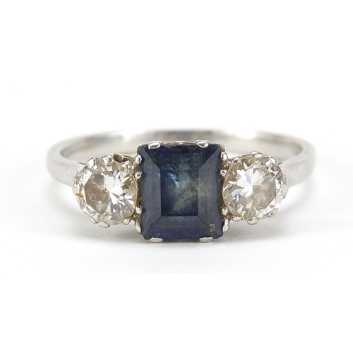 50 - Unmarked platinum sapphire and diamond ring, the sapphire approximately 6.4mm x 5.0mm, the diamonds ... 