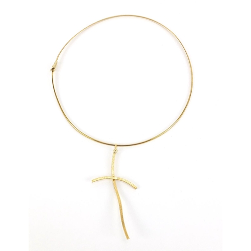 728 - Large 9ct gold Modernist cross pendant on a 9ct gold necklace, 7.5cm high and 38cm in length, total ... 